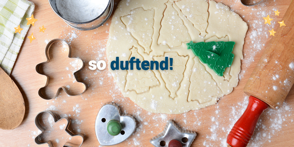 KI generiert: Teig mit Ausstechformen, Weihnachtsbaum-Motive; Text: "so duftend!"