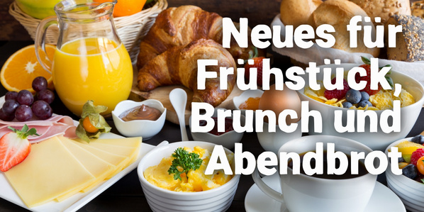 KI generiert: Ein reichhaltiges Frühstück mit Text: "Neues für Frühstück, Brunch und Abendbrot".